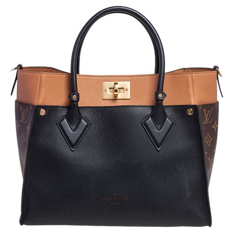 black tote bag louis vuitton|black louis vuitton side bag.